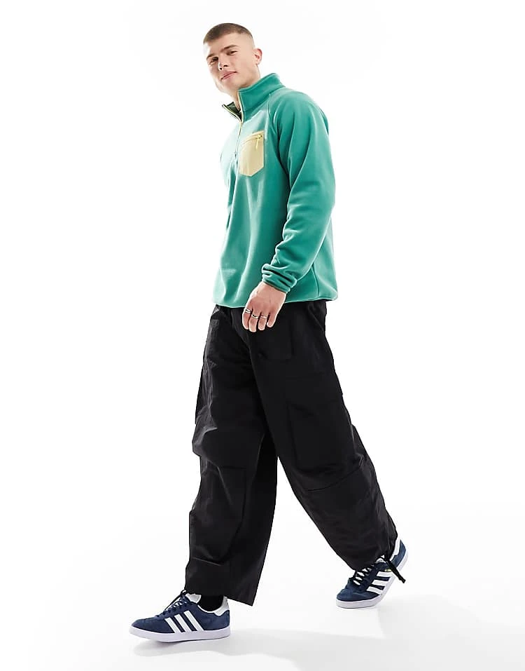 Cotton:On Cotton On Quarter Zip Relaxed Fleece Sweatshirt With Contrast Pocket In Washed Green For Men 3 Cotton:On Cotton On Quarter Zip Relaxed Fleece Sweatshirt With Contrast Pocket In Washed Green For Men - Image 2