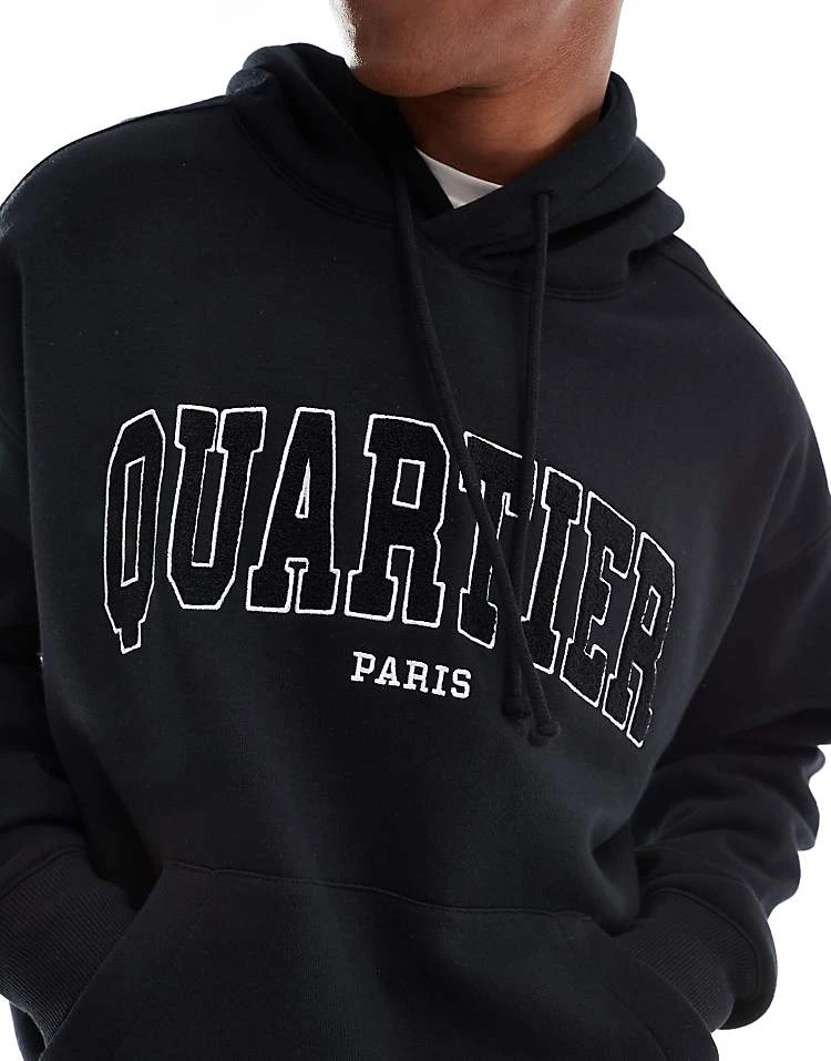 Cotton:On Cotton On Boxy Fit Pullover Hoodie In Black With Paris Graphic For Men 4 Cotton:On Cotton On Boxy Fit Pullover Hoodie In Black With Paris Graphic For Men - Image 2
