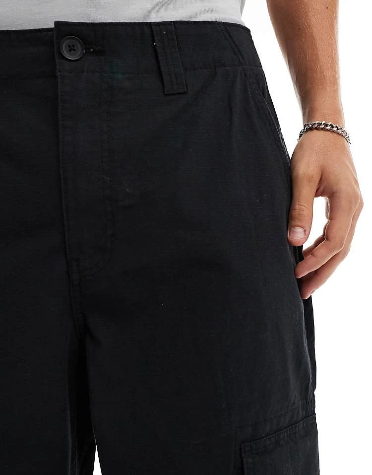 Cotton:On Cotton On Baggy Style Pocket Utility Pants In Black Ripstop For Men 7 Cotton:On Cotton On Baggy Style Pocket Utility Pants In Black Ripstop For Men - Image 5