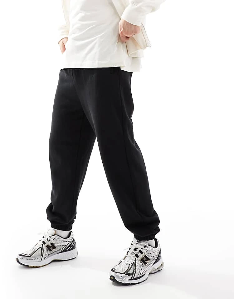 Cotton:On Baggy Cuffed Track Pant In Black For Men 6 Cotton:On Baggy Cuffed Track Pant In Black For Men - Image 4