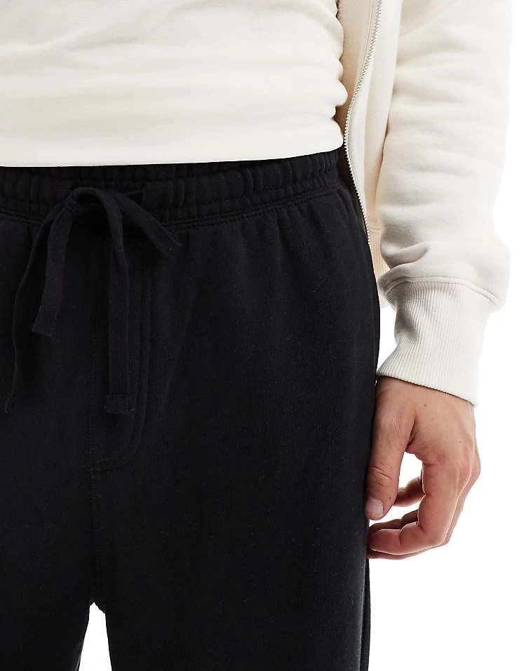 Cotton:On Baggy Cuffed Track Pant In Black For Men 7 Cotton:On Baggy Cuffed Track Pant In Black For Men - Image 5