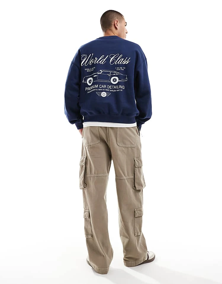 Cotton:On Cotton On Boxy Fit Sweatshirt In Navy With World Class Retro Graphic For Men Indigo 5 Cotton:On Cotton On Boxy Fit Sweatshirt In Navy With World Class Retro Graphic For Men Indigo - Image 3